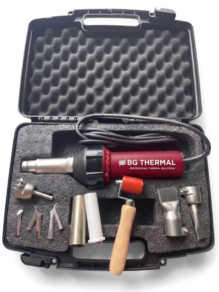 BG Thermal 1600W hot air plastic welding gun kit with speed nozzles, silicone pressure roller, replacement heating element, and heavy-duty carrying case